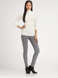 Featherweight rib knit kissed with a hint of soft cashmere, all in a classic turtleneck style.FittedLong sleevesPullover style40% rayon/30% nylon/25% polyester/5% cashmereDry cleanImportedModel shown is 5'11 (180cm) wearing US size Small. Featherweight rib knit kissed with a hint of soft cashmere, all in a classic turtleneck style.FittedLong sleevesPullover style40% rayon/30% nylon/25% polyester/5% cashmereDry cleanImportedModel shown is 5'11 (180cm) wearing US size Small.