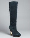 Plush suede shafts are punctuated by bold, golden heel accents that make the entire look ultra luxe; by Rebecca Taylor.