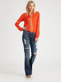 Distressing, sanding and grinding adds the perfect lived-in finish to this sexy contoured silhouette of lightweight denim.THE FITFitted through hips and thighsFlare legRise, about 8Inseam, about 34½THE DETAILSZip flyFive-pocket style98% cotton/2% spandexMachine washMade in USA of imported fabricModel shown is 5'9 (175cm) wearing US size 4. Distressing, sanding and grinding adds the perfect lived-in finish to this sexy contoured silhouette of lightweight denim.THE FITFitted through hips and thighsFlare legRise, about 8Inseam, about 34½THE DETAILSZip flyFive-pocket style98% cotton/2% spandexMachine washMade in USA of imported fabricModel shown is 5'9 (175cm) wearing US size 4.