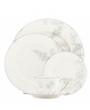 Muted blooms flourish on the fine white porcelain of Lenox Dinnerware's Wisteria place settings, garnishing formal tables with quiet, contemporary grace. With a sumptuous platinum finish to enhance even the most elegant dining atmospheres. (Clearance)