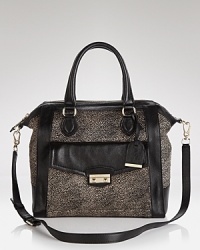City savvy with style to spare. This Cole Haan satchel is everything we need (and want) in a day bag, crafted of leather with a versatile dual function design. City savvy with style to spare. This Cole Haan satchel is everything we need (and want) in a day bag, crafted of leather with a versatile dual function design.