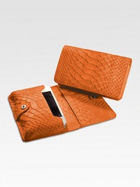Designed to hold your iphone in slim, trim style, this case of python-embossed leather slips right into your bag or pocket.HandcraftedFoldover snap closeiphone pocketThree card slots5¼L X 3WImported Designed to hold your iphone in slim, trim style, this case of python-embossed leather slips right into your bag or pocket.HandcraftedFoldover snap closeiphone pocketThree card slots5¼L X 3WImported