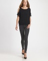 Glossy, leather-like finish reinvents your favorite stretchy skinnies. THE FITSkinny fitRise, about 9½Inseam, about 32THE DETAILSZip flyFive-pocket style44% rayon/29% cotton/25% cupro/2% polyurethaneDry cleanMade in USA of imported fabricModel shown is 5'11 (180cm) wearing US size 4.