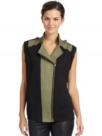 THE LOOKColorblock & mixed media design Stand collar Sleeveless with cuff detailEpaulettesOffset front zip closureTHE FITAbout 26 from shoulder to hemTHE MATERIALPolyesterContrast: cottonCARE & ORIGINHand wash ImportedModel shown is 5'10 (177cm) wearing US size Small. THE LOOKColorblock & mixed media design Stand collar Sleeveless with cuff detailEpaulettesOffset front zip closureTHE FITAbout 26 from shoulder to hemTHE MATERIALPolyesterContrast: cottonCARE & ORIGINHand wash ImportedModel shown is 5'10 (177cm) wearing US size Small.