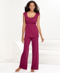 Perfect for a lazy Sunday spent lounging around the house. This adorable pajama set from Alfani features a short-sleeved scoop neck top and full-length pants. Perfect for a lazy Sunday spent lounging around the house. This adorable pajama set from Alfani features a short-sleeved scoop neck top and full-length pants.