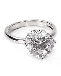 A treasure-forever statement, this Crislu ring is exquisitely elegant cast in pure platinum finished sterling silver with a singular, hand-faceted cubic zirconia stone. A treasure-forever statement, this Crislu ring is exquisitely elegant cast in pure platinum finished sterling silver with a singular, hand-faceted cubic zirconia stone.