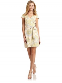 THE LOOKCharming floral paisley printWrap-front styleSurplice v-necklineCap sleevesSelf sash ties around the waistTHE FITAbout 35 from shoulder to hemTHE MATERIAL92% polyester/8% spandex CARE & ORIGINDry cleanImportedModel shown is 5'9½ (176cm) wearing US size Small. THE LOOKCharming floral paisley printWrap-front styleSurplice v-necklineCap sleevesSelf sash ties around the waistTHE FITAbout 35 from shoulder to hemTHE MATERIAL92% polyester/8% spandex CARE & ORIGINDry cleanImportedModel shown is 5'9½ (176cm) wearing US size Small.