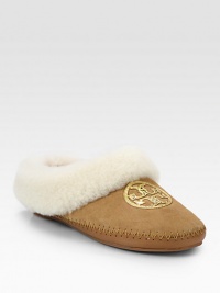 Light-catching sequins form a signature medallion on this casual suede staple lined with cozy shearling. Suede and shearling upper with sequinsShearling liningRubber solePadded insoleImported Light-catching sequins form a signature medallion on this casual suede staple lined with cozy shearling. Suede and shearling upper with sequinsShearling liningRubber solePadded insoleImported