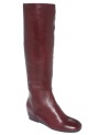 Smooth and sleek with a hidden wedge, Boutique 9's Zanny single sole tall boots will be your new go-to shoe for fall.