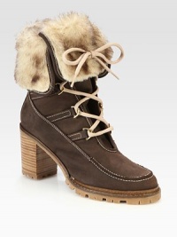 Plush shearling tops this lace-up suede essential, with a powerful heel and a rubber trek sole for extra traction. Stacked heel, 3¼ (100mm)Suede and shearling upperLeather liningRubber trek solePadded insoleImported Plush shearling tops this lace-up suede essential, with a powerful heel and a rubber trek sole for extra traction. Stacked heel, 3¼ (100mm)Suede and shearling upperLeather liningRubber trek solePadded insoleImported