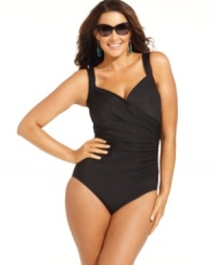 Showcasing graceful lines and sleek styling, this plus size swimsuit by Miraclesuit whittles your middle and exudes a carefree attitude at the same time.