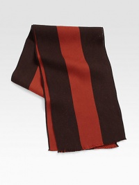 Handsome stripe design, crafted in a luxurious blend of Italian wool and silk, lends warmth and sophistication to your seasonal wardrobe.Fringed ends12W x 70L98% wool/2% silkDry cleanMade in Italy Handsome stripe design, crafted in a luxurious blend of Italian wool and silk, lends warmth and sophistication to your seasonal wardrobe.Fringed ends12W x 70L98% wool/2% silkDry cleanMade in Italy