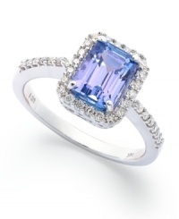 A display of elegance. This 14k white gold ring shines brightly with a tanzanite (1-1/2 ct. t.w.) offset by brilliant emerald-cut diamonds (1/4 ct. t.w.) for a sophisticated touch. A display of elegance. This 14k white gold ring shines brightly with a tanzanite (1-1/2 ct. t.w.) offset by brilliant emerald-cut diamonds (1/4 ct. t.w.) for a sophisticated touch.