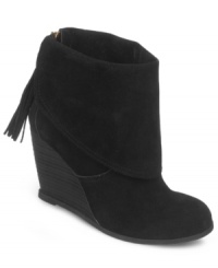 Stylistically speaking, these cute shoes will have you on the straight and narrow. The Conduct booties by Fergalicious feature a fold-over shaft and back zipper with fringed zipper tab. Stylistically speaking, these cute shoes will have you on the straight and narrow. The Conduct booties by Fergalicious feature a fold-over shaft and back zipper with fringed zipper tab.
