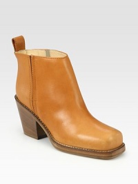 Rich leather enriched by a stacked heel, back pull tab and comfy elastic side goring. Stacked heel, 3½ (90mm)Leather upperLeather liningRubber solePadded insoleMade in ItalyOUR FIT MODEL RECOMMENDS ordering one size up as this style runs small. Rich leather enriched by a stacked heel, back pull tab and comfy elastic side goring. Stacked heel, 3½ (90mm)Leather upperLeather liningRubber solePadded insoleMade in ItalyOUR FIT MODEL RECOMMENDS ordering one size up as this style runs small.
