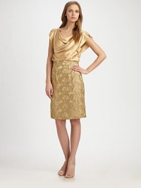 Silk satin in a beautifully draped style, finished with a fitted, metallic lace skirt.Cowl necklineFlutter cap sleevesDraped bodiceLace skirtBack keyhole detailBack ventConcealed back zipFully linedAbout 24 from natural waistSilkDry cleanImportedModel shown is 5'9½ (177cm) wearing US size 4. Silk satin in a beautifully draped style, finished with a fitted, metallic lace skirt.Cowl necklineFlutter cap sleevesDraped bodiceLace skirtBack keyhole detailBack ventConcealed back zipFully linedAbout 24 from natural waistSilkDry cleanImportedModel shown is 5'9½ (177cm) wearing US size 4.
