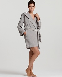 Plush, absorbent, and colorful women's robe with a hood and large bouclé croc on the shoulder. Plush, absorbent, and colorful women's robe with a hood and large bouclé croc on the shoulder.