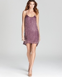 A sparkling Parker dress touts beautiful beads that illuminate this silk silhouette with easy elegance. A low, scoop back adds allure for a breathtaking finish. A sparkling Parker dress touts beautiful beads that illuminate this silk silhouette with easy elegance. A low, scoop back adds allure for a breathtaking finish.