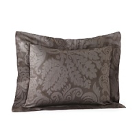 Egyptian cotton is woven in Italy into a serene and sweet sateen jacquard. Large scrolls play across the shining surface of the duvet covers and shams, each finished with a plain hem and decorated with a subtle flange.The duvet covers are backed in a plain sateen while the shams feature the jacquard pattern on the front and back. Egyptian cotton is woven in Italy into a serene and sweet sateen jacquard. Large scrolls play across the shining surface of the duvet covers and shams, each finished with a plain hem and decorated with a subtle flange.The duvet covers are backed in a plain sateen while the shams feature the jacquard pattern on the front and back.