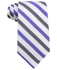 In a traditional repp stripe pattern, this Calvin Klein tie recalls classic haberdashery style. In a traditional repp stripe pattern, this Calvin Klein tie recalls classic haberdashery style.