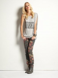 Majorly soft tank with a single dolman sleeve and downtown-cool print that reads, REBEL. RoundneckSingle dolman sleeveLonger length hits below the hipsModalDry cleanMade in USAModel shown is 5'10 (177cm) wearing US size Small. Majorly soft tank with a single dolman sleeve and downtown-cool print that reads, REBEL. RoundneckSingle dolman sleeveLonger length hits below the hipsModalDry cleanMade in USAModel shown is 5'10 (177cm) wearing US size Small.