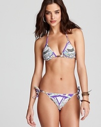 It's the season of the statement suit, and Mara Hoffman's bold styles are a perfect way to tie the trend. In a tribal inspired pattern, this string bikini is sure to make a splash. It's the season of the statement suit, and Mara Hoffman's bold styles are a perfect way to tie the trend. In a tribal inspired pattern, this string bikini is sure to make a splash.
