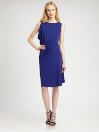 Beautifully crafted jersey dress with asymmetrical draping that flatters any body type. RoundneckDraped right shoulderCropped back hemInvisible side zipperAbout 25 from natural waistRayonDry cleanMade in USA of imported fabricModel shown is 5'11 (178cm) wearing US size Small. Beautifully crafted jersey dress with asymmetrical draping that flatters any body type. RoundneckDraped right shoulderCropped back hemInvisible side zipperAbout 25 from natural waistRayonDry cleanMade in USA of imported fabricModel shown is 5'11 (178cm) wearing US size Small.