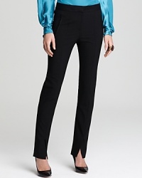 Command a strong stance in these sleek Rachel Roy pants, touting a trend-right vent to lengthen your leg line...and showoff this season's fabulous shoes. Command a strong stance in these sleek Rachel Roy pants, touting a trend-right vent to lengthen your leg line...and showoff this season's fabulous shoes.