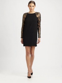 Sheer lace sleeves take on a subtle metallic glint on this lightweight crepe shift.JewelneckRaglan sleevesFlat frontCenter back zipperAbout 19 from natural waist72% nylon/28% polyesterDry cleanImportedModel shown is 5'10 (177cm) wearing US size 4. Sheer lace sleeves take on a subtle metallic glint on this lightweight crepe shift.JewelneckRaglan sleevesFlat frontCenter back zipperAbout 19 from natural waist72% nylon/28% polyesterDry cleanImportedModel shown is 5'10 (177cm) wearing US size 4.