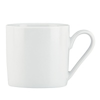 Vivid white porcelain embossed with a subtle crosshatch pattern gives this mug from Dansk versatile warmth, and just a hint of texture.