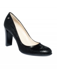 Climb the style ladder. Calvin Klein's classic Olive pumps feature lizard embellishments and high heels that put the chic in office wear. Climb the style ladder. Calvin Klein's classic Olive pumps feature lizard embellishments and high heels that put the chic in office wear.