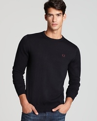 Soft merino wool is blended with refined cotton in this handsome crewneck sweater, an essential design you'll come to rely on week after week. Featuring Fred Perry's signature crest at the left chest for classic appeal. Soft merino wool is blended with refined cotton in this handsome crewneck sweater, an essential design you'll come to rely on week after week. Featuring Fred Perry's signature crest at the left chest for classic appeal.