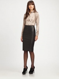 A timeless skirt silhouette made from Italian lambskin with a hint of stretch for a fantastic fit.Waist dartsBack zipperBack ventFully linedAbout 25 longLambskin leatherDry clean by leather specialistImported Model shown is 5'9½ (176cm) wearing US size 4. A timeless skirt silhouette made from Italian lambskin with a hint of stretch for a fantastic fit.Waist dartsBack zipperBack ventFully linedAbout 25 longLambskin leatherDry clean by leather specialistImported Model shown is 5'9½ (176cm) wearing US size 4.