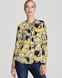 Sophisticated with polished pencils skirts or feminine with your favorite jeans, this graphic-print DIANE von FURSTENBERG blouse proves to be as versatile as it is chic. Sophisticated with polished pencils skirts or feminine with your favorite jeans, this graphic-print DIANE von FURSTENBERG blouse proves to be as versatile as it is chic.