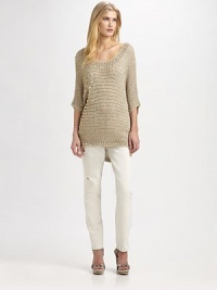 Shimmering paillettes add instant glamour to this cotton/silk knit sweater with an ultra-feminine, curved hem.ScoopneckThree-quarter sleevesCurved hemAbout 31 from shoulder to hem70% cotton/30% silkDry cleanImported Model shown is 5'10½ (179cm) wearing US size Small. Shimmering paillettes add instant glamour to this cotton/silk knit sweater with an ultra-feminine, curved hem.ScoopneckThree-quarter sleevesCurved hemAbout 31 from shoulder to hem70% cotton/30% silkDry cleanImported Model shown is 5'10½ (179cm) wearing US size Small.