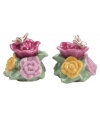 Season your meal with blooming salt and pepper shakers. Shaped like colorful English rose blossoms and topped with gold-winged butterflies, this pair adds grace and charm to your table in the tradition of the Old Country Roses dinnerware and dishes collection from Royal Doulton.