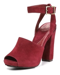 Wine-hued suede picks up autumn's '70s theme in rich, vivid color. Pair with patterned tights for a tempting play on texture. By DIANE von FURSTENBERG. Wine-hued suede picks up autumn's '70s theme in rich, vivid color. Pair with patterned tights for a tempting play on texture. By DIANE von FURSTENBERG.