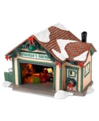 Before they hit the road this Christmas, Snow Village residents will get their cars checked out at the local family-run place, Grandpa's Garage. Traditional garland and a fresh dusting of snow give it a festive touch. Before they hit the road this Christmas, Snow Village residents will get their cars checked out at the local family-run place, Grandpa's Garage. Traditional garland and a fresh dusting of snow give it a festive touch.