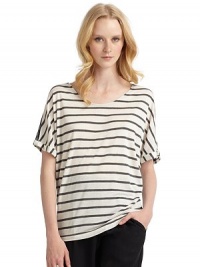 THE LOOKAllover stripe printDolman sleevesChiffon back panelTHE FITAbout 25 from shoulder to hemTHE MATERIAL50% polyester/40% rayon/10% linenSecond fabric: silkCARE & ORIGINDry cleanImportedModel shown is 5'10½ (179cm) wearing US size Small. THE LOOKAllover stripe printDolman sleevesChiffon back panelTHE FITAbout 25 from shoulder to hemTHE MATERIAL50% polyester/40% rayon/10% linenSecond fabric: silkCARE & ORIGINDry cleanImportedModel shown is 5'10½ (179cm) wearing US size Small.