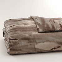 Inspired by the wild game of Africa, but reinterpreted in a watercolor abstracted way in bronze, taupe and earth colors on sateen. Duvet has hidden button closure. Duvets, shams and comforters are self-reversing. Inspired by the wild game of Africa, but reinterpreted in a watercolor abstracted way in bronze, taupe and earth colors on sateen. Duvet has hidden button closure. Duvets, shams and comforters are self-reversing.