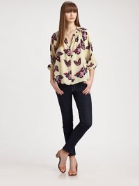 Vibrant butterflies capture the charm of summer in this airy blouson silhouette crafted from woven silk georgette.Shirred jewelneckButton-down frontGathered sleevesGathered backAbout 24 from shoulder to hemSilkDry cleanMade in USA of imported fabricModel shown is 5'10 (177cm) wearing US size Small. Vibrant butterflies capture the charm of summer in this airy blouson silhouette crafted from woven silk georgette.Shirred jewelneckButton-down frontGathered sleevesGathered backAbout 24 from shoulder to hemSilkDry cleanMade in USA of imported fabricModel shown is 5'10 (177cm) wearing US size Small.