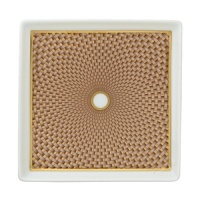 Embellished with an organically complex floral basket weave pattern and rendered in gold-tipped earthy hues, the Reynaud Tresor beige small tray lends boho-chic sophistication to the dining table. Embellished with an organically complex floral basket weave pattern and rendered in gold-tipped earthy hues, the Reynaud Tresor beige small tray lends boho-chic sophistication to the dining table.