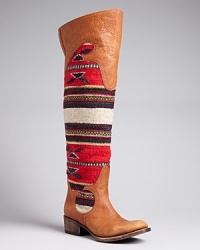 The height of Western-influenced wow, these over-the-knee FREEBIRD boots feature bold, blanket-patterned shafts paired with cowgal-inspired leather accents. Spice up your basics. The height of Western-influenced wow, these over-the-knee FREEBIRD boots feature bold, blanket-patterned shafts paired with cowgal-inspired leather accents. Spice up your basics.