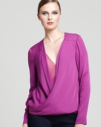 Wear it now and layer it as the chill of fall sets in--this stylishly draped front DIANE von FURSTENBERG top sets the tone for dressing in easy-chic pieces this season. Wear it now and layer it as the chill of fall sets in--this stylishly draped front DIANE von FURSTENBERG top sets the tone for dressing in easy-chic pieces this season.