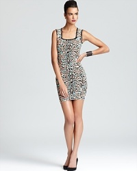 A leopard print is rendered in pastel hues on BCBGMAXAZRIA's square-neck dress, crafted in a curve-skimming, fitted knit. A leopard print is rendered in pastel hues on BCBGMAXAZRIA's square-neck dress, crafted in a curve-skimming, fitted knit.