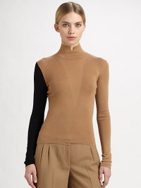 Contrast colorblock makes this knit the perfect modern edge to any pant. Notched mock neckFront-V detailLong sleeves70% wool/30% silkDry cleanMade in SwitzerlandModel shown is 5'11 (180cm) wearing US size 4. Contrast colorblock makes this knit the perfect modern edge to any pant. Notched mock neckFront-V detailLong sleeves70% wool/30% silkDry cleanMade in SwitzerlandModel shown is 5'11 (180cm) wearing US size 4.