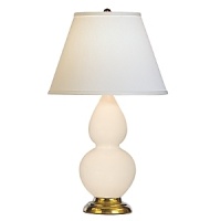 Bone glazed ceramic finish. Three way switch. Antique natural brass finished accents. Pearl Dupioni fabric shade. Bone glazed ceramic finish. Three way switch. Antique natural brass finished accents. Pearl Dupioni fabric shade.