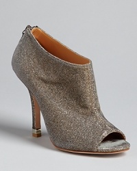 Whether you're rocking your favorite jeans or an evening gown, these glam Badgley Mischka evening booties let you step out in style. Whether you're rocking your favorite jeans or an evening gown, these glam Badgley Mischka evening booties let you step out in style.