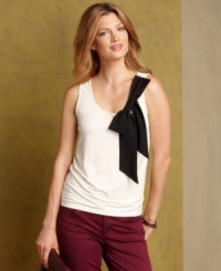 Tommy Hilfiger's tank top gets girly thanks to a pretty bow at the shoulder. Pair it with pants to keep it casual or with a pencil skirt for a special night out! (Clearance) Tommy Hilfiger's tank top gets girly thanks to a pretty bow at the shoulder. Pair it with pants to keep it casual or with a pencil skirt for a special night out! (Clearance)