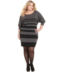 Shine in one of the season's hottest trends with DKNY Jeans' plus size sweater dress, featuring a striped metallic finish. Shine in one of the season's hottest trends with DKNY Jeans' plus size sweater dress, featuring a striped metallic finish.